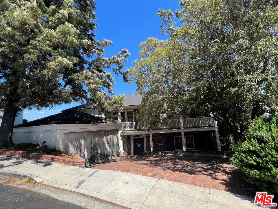 a view of a house with a patio