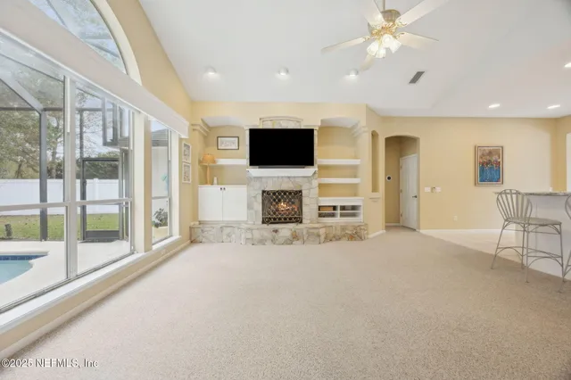 a bathroom with a sink and mirror with toilet