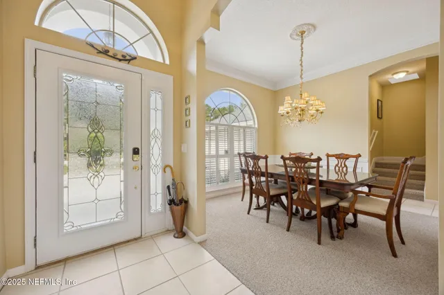 a kitchen with stainless steel appliances granite countertop a stove and cabinets