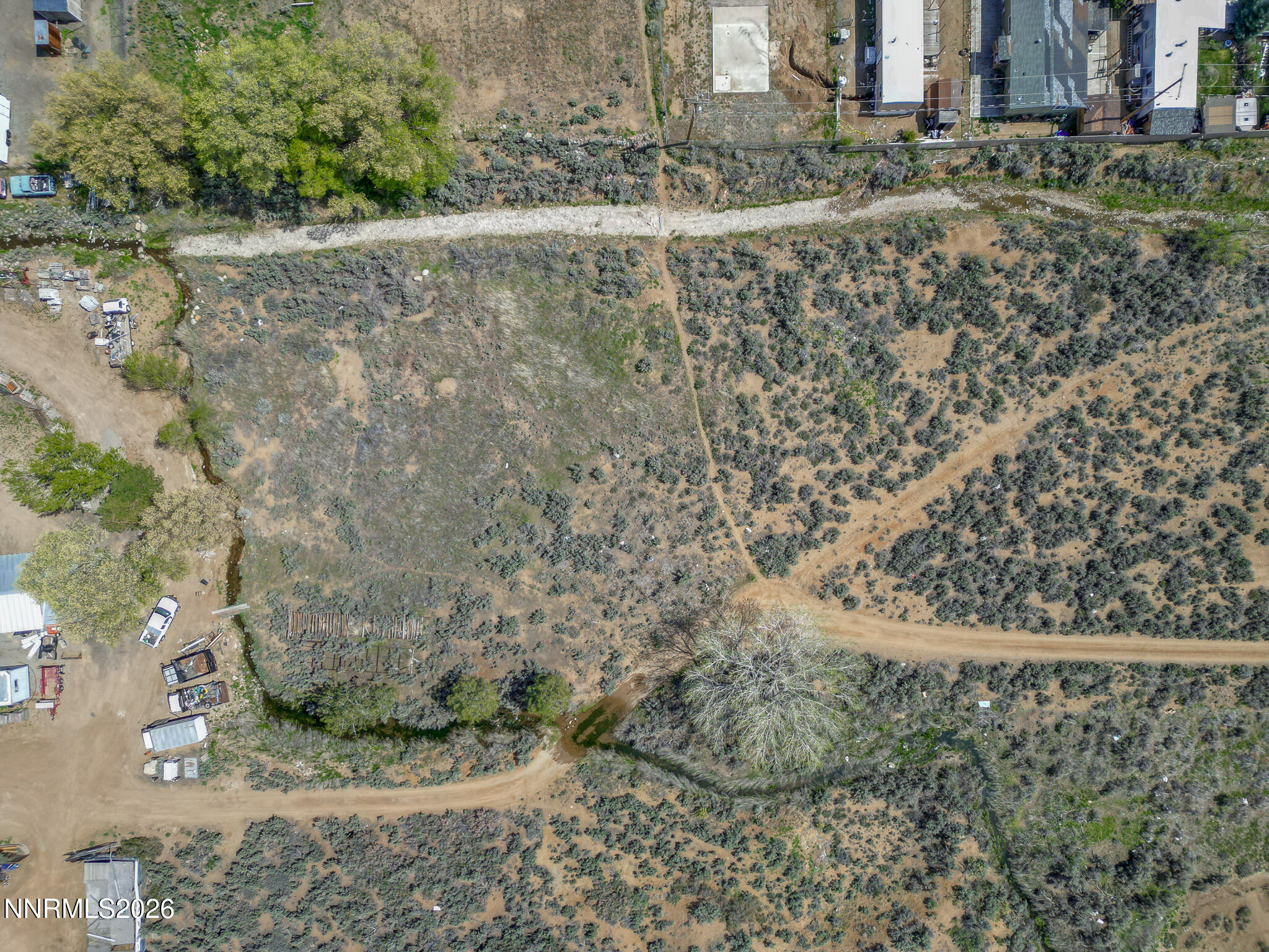 8550 Cindy Avenue Reno, NV 89506 - Photo 21 of 39 a view of a yard with wooden fence