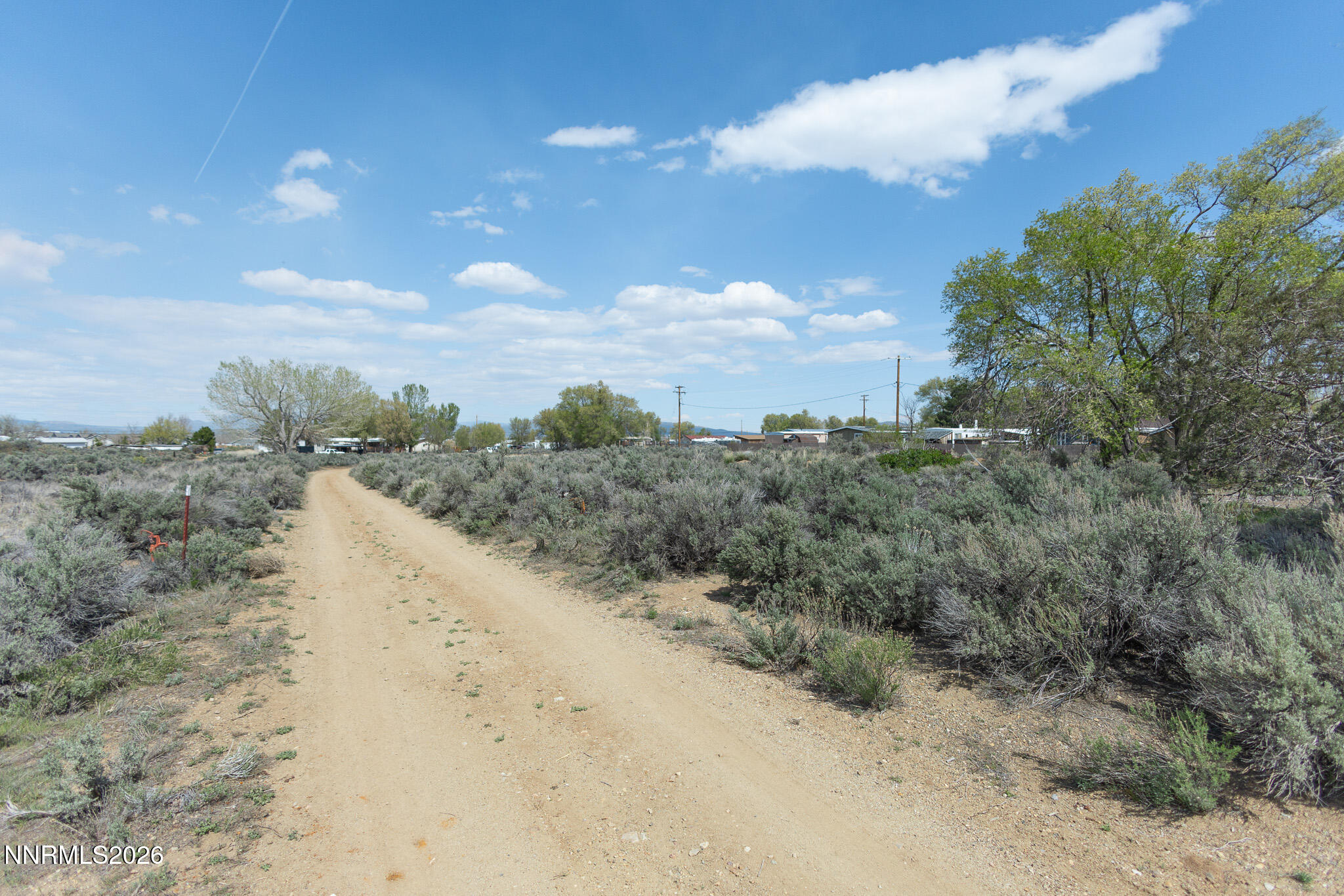 8550 Cindy Avenue Reno, NV 89506 - Photo 35 of 39 a view of a dry field with trees in the background