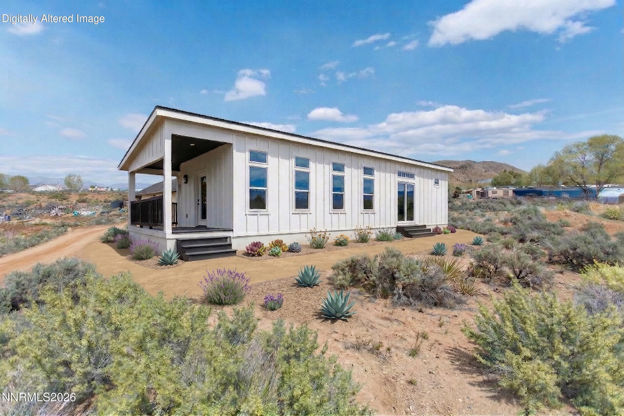 8550 Cindy Avenue Reno, NV 89506 - Photo 39 of 39 a view of a house with a yard