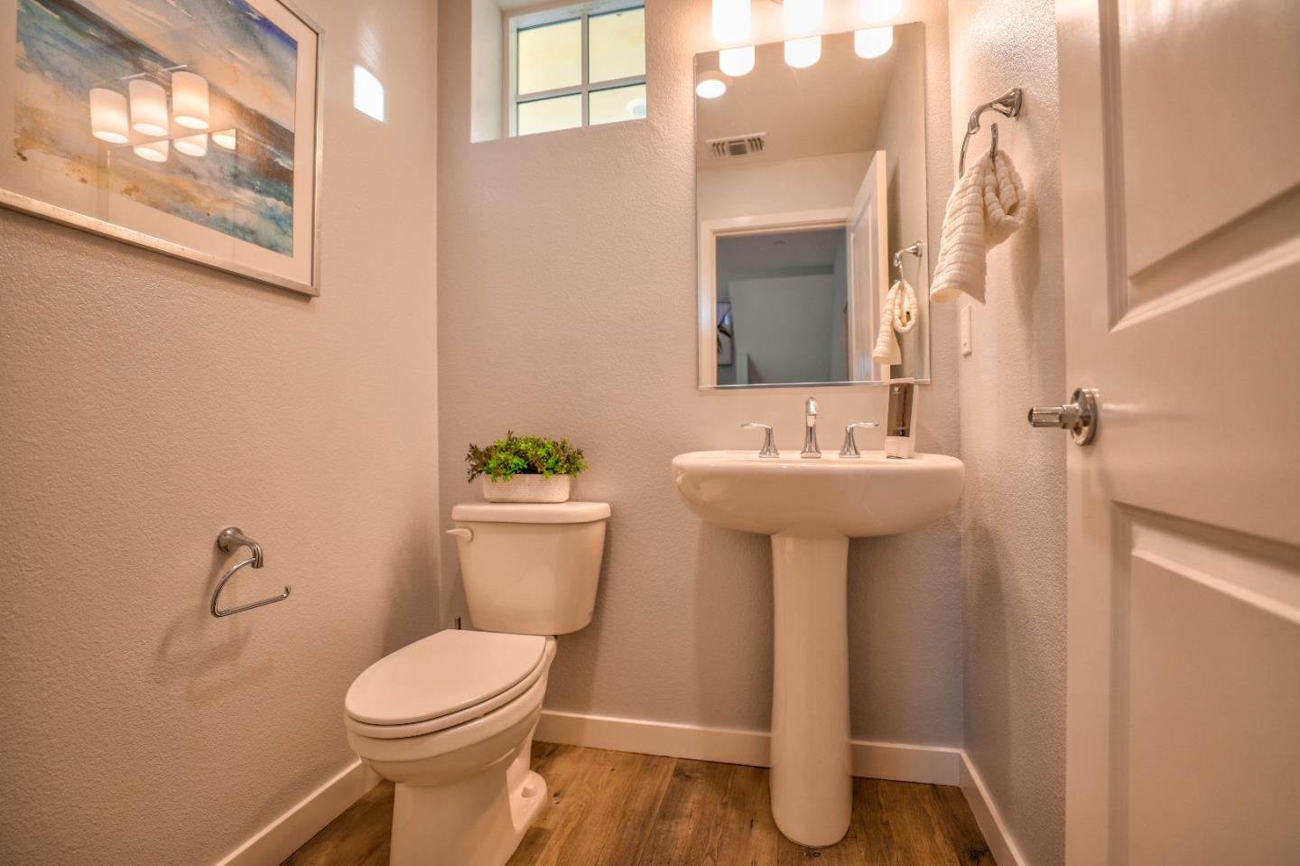 3856 Domain Way Mountain View, CA 94043 - Photo 12 of 39 a bathroom with a sink toilet and a mirror
