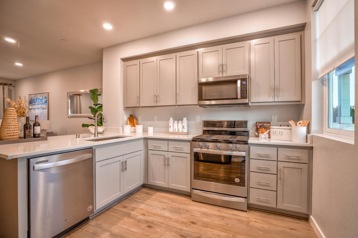 3856 Domain Way Mountain View, CA 94043 - Photo 15 of 39 a kitchen with cabinets stainless steel appliances and a window