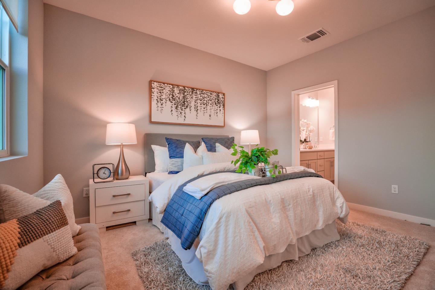 3856 Domain Way Mountain View, CA 94043 - Photo 22 of 39 a bedroom with a bed a couch and painting on the wall