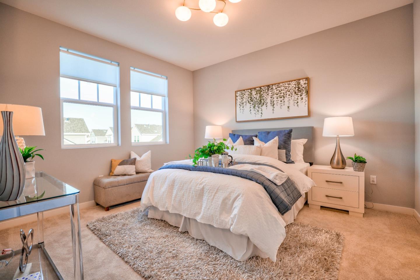 3856 Domain Way Mountain View, CA 94043 - Photo 25 of 39 a bedroom with a bed couches chair and a large window