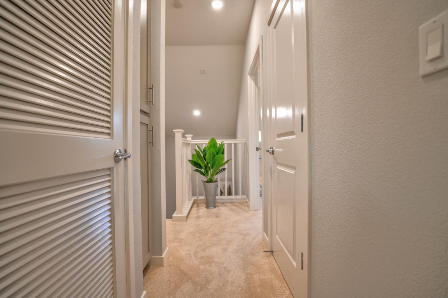 3856 Domain Way Mountain View, CA 94043 - Photo 28 of 39 a view of a hallway with wooden floor