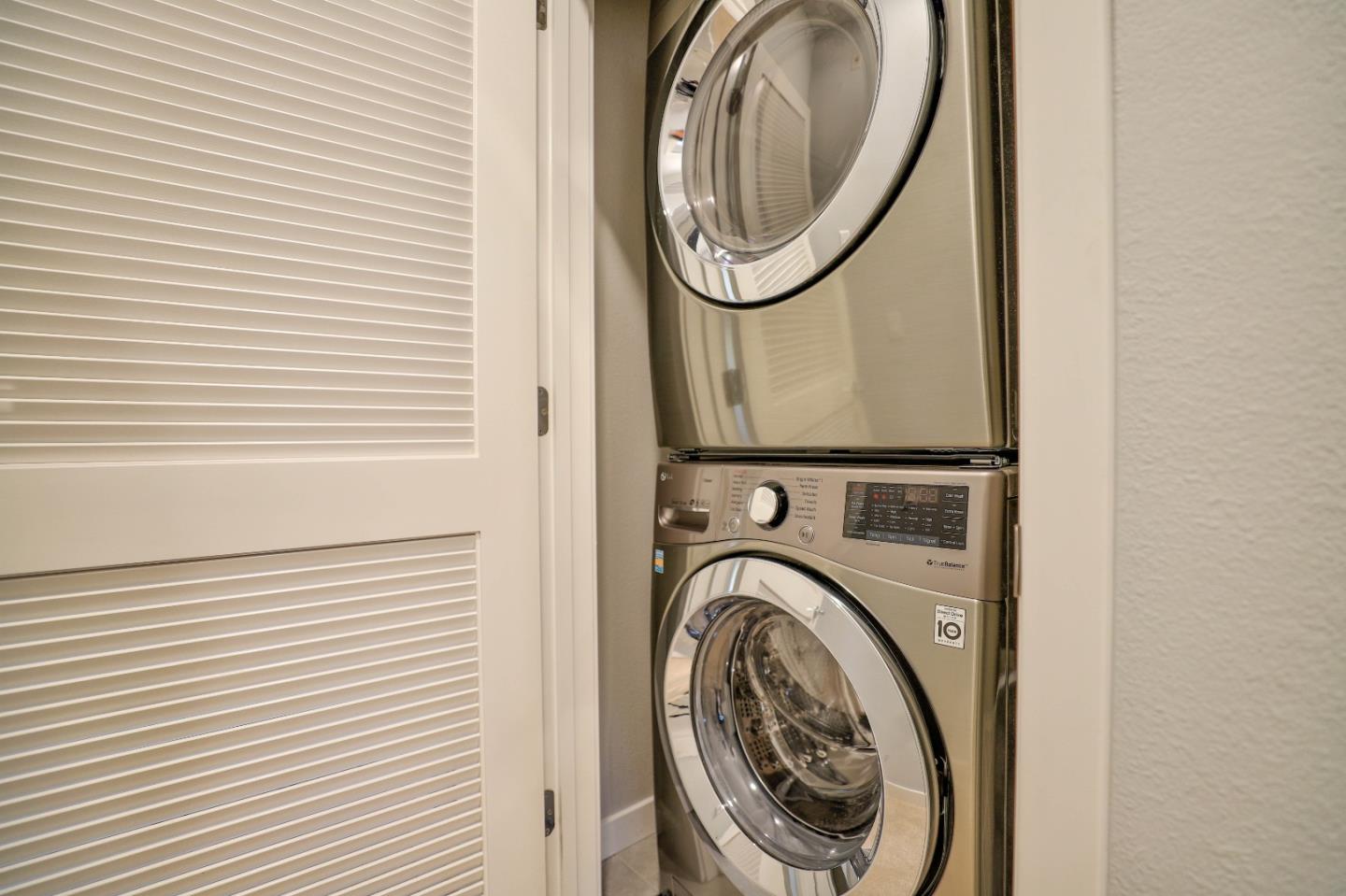 3856 Domain Way Mountain View, CA 94043 - Photo 32 of 39 a view of a hallway with washer and dryer