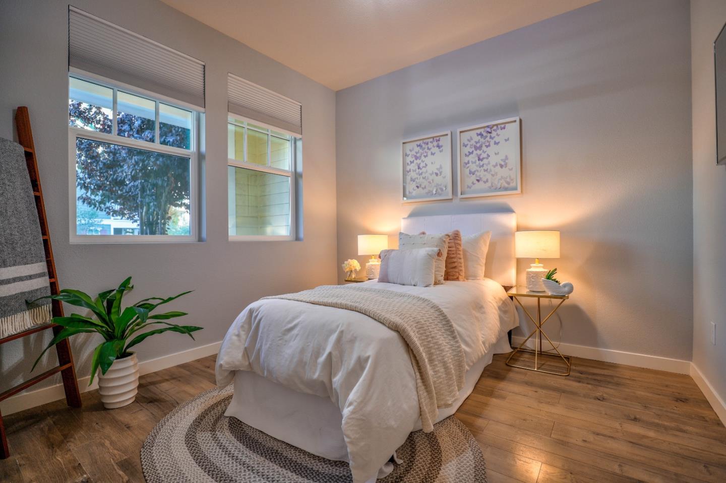 3856 Domain Way Mountain View, CA 94043 - Photo 34 of 39 a bedroom with a bed and a potted plant
