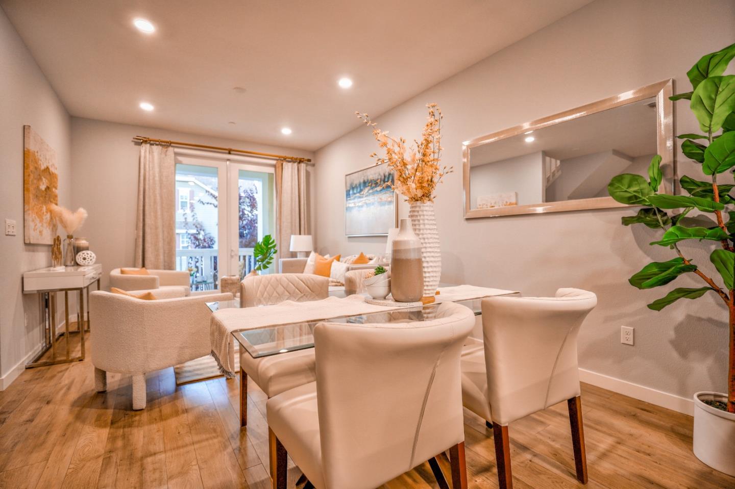3856 Domain Way Mountain View, CA 94043 - Photo 10 of 39 a dining room with furniture and a potted plant