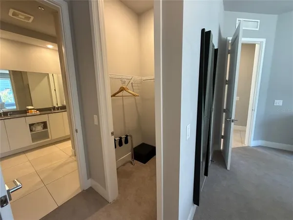a view of a bathroom from the hallway