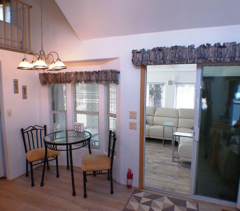 84136 Ave 44, Unit 150 Indio, CA 92203 - Photo 12 of 37 a view of a livingroom with furniture and window
