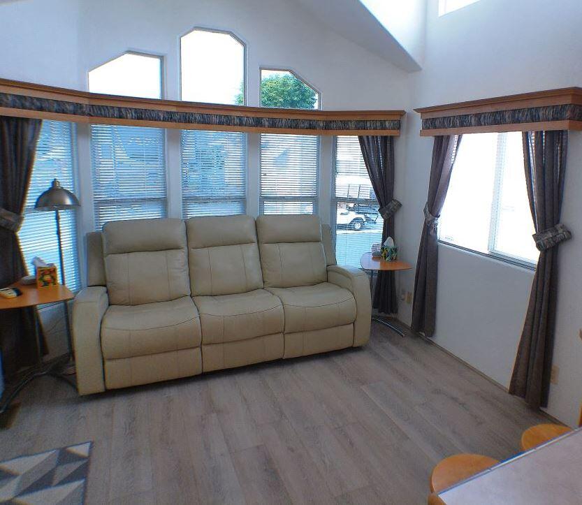 84136 Ave 44, Unit 150 Indio, CA 92203 - Photo 20 of 37 a living room with furniture and a window