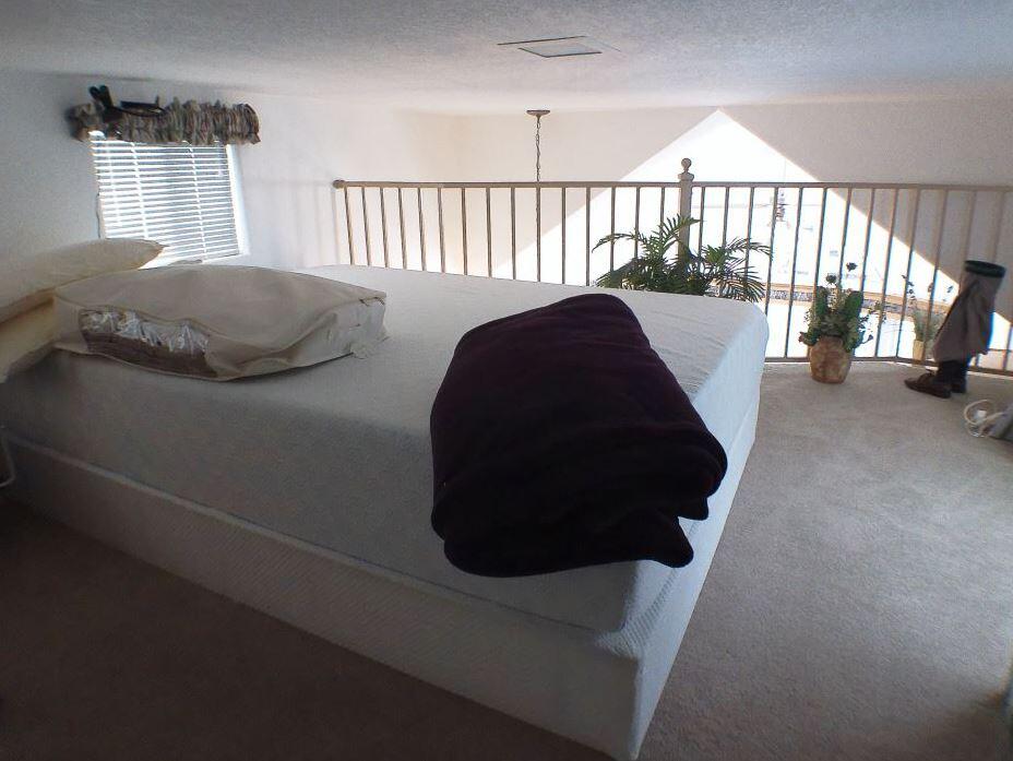 84136 Ave 44, Unit 150 Indio, CA 92203 - Photo 34 of 37 a living room with a couch