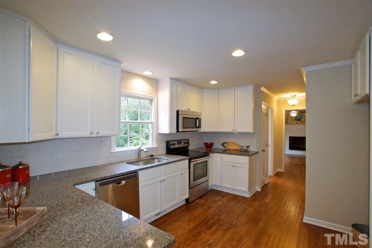 345 East Millbrook Road Raleigh, NC 27609 - Photo 12 of 24 NEW FLOORING, CABINETS, APPLIANCES, GRANITE, SINK, & PLUMBING FIXTURES!