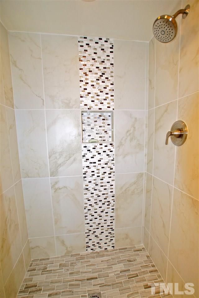 345 East Millbrook Road Raleigh, NC 27609 - Photo 23 of 24 BEAUTIFUL CUSTOM TILE WORK!