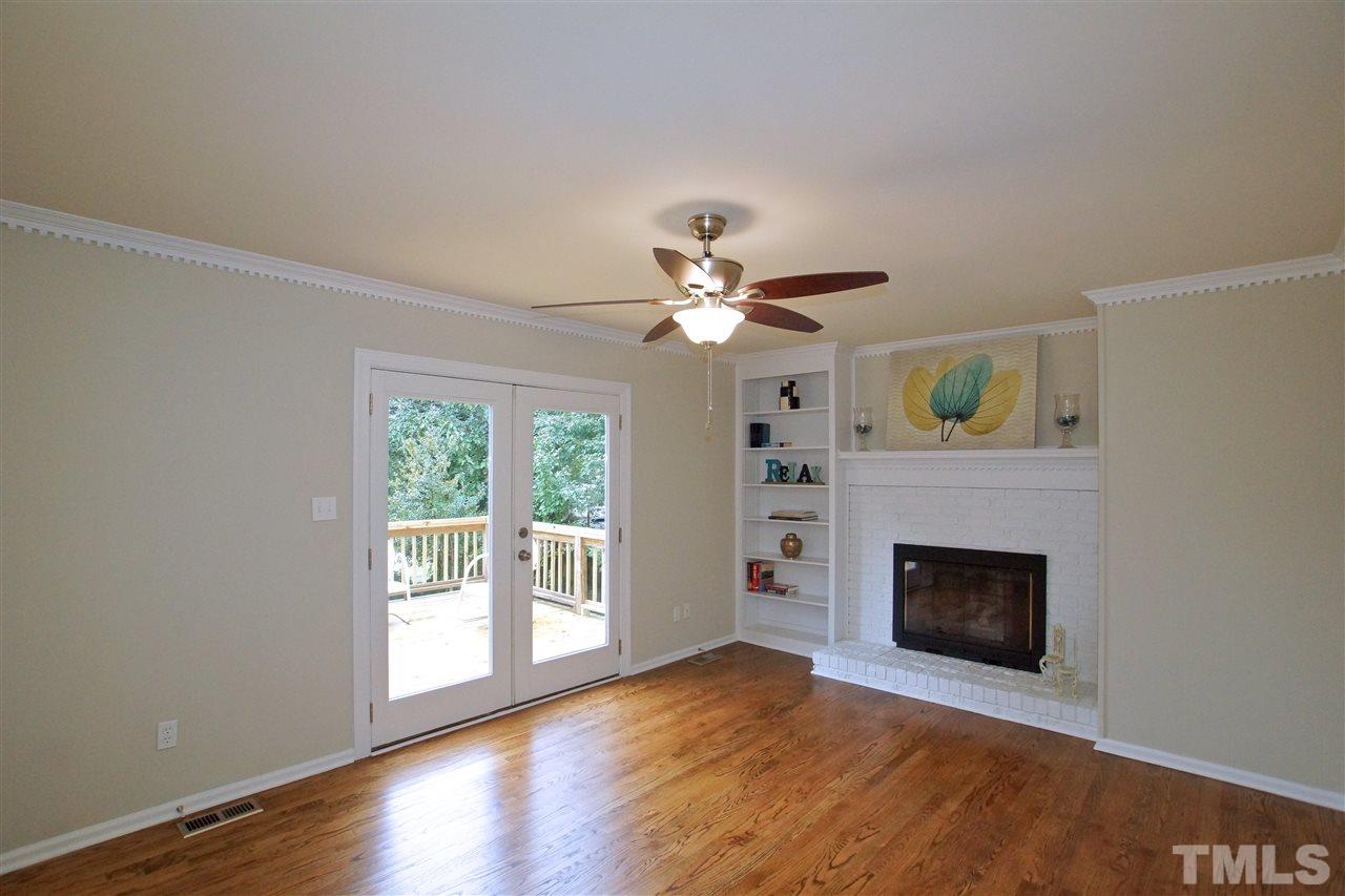 345 East Millbrook Road Raleigh, NC 27609 - Photo 9 of 24 FAMILY ROOM WITH GAS LOG FIREPLACE AND ACCESS TO DECK!