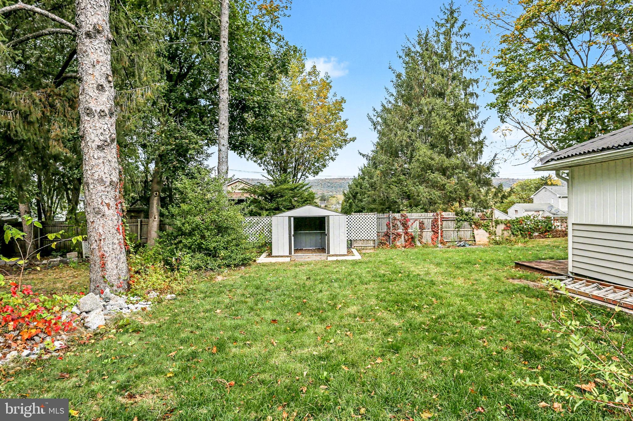 233 West Columbia Road Enola, PA 17025 - Photo 14 of 15 a house view with a garden space