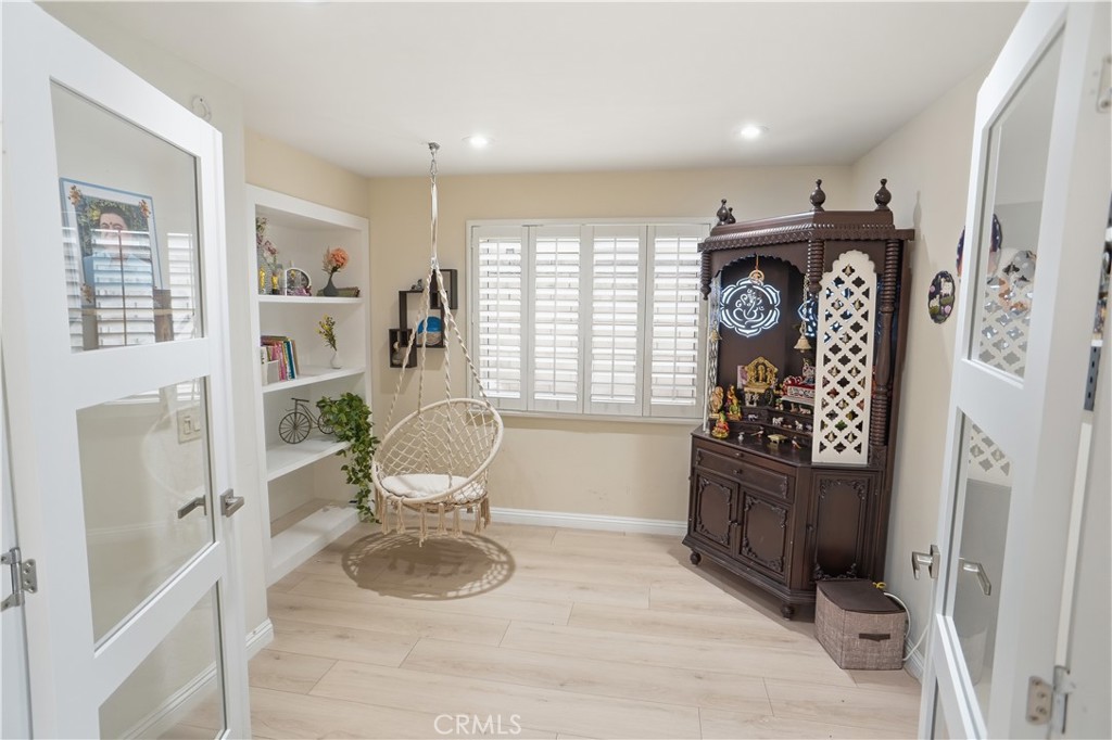 25550 Longfellow Place Stevenson Ranch, CA 91381 - Photo 12 of 30 a living room with furniture and a window