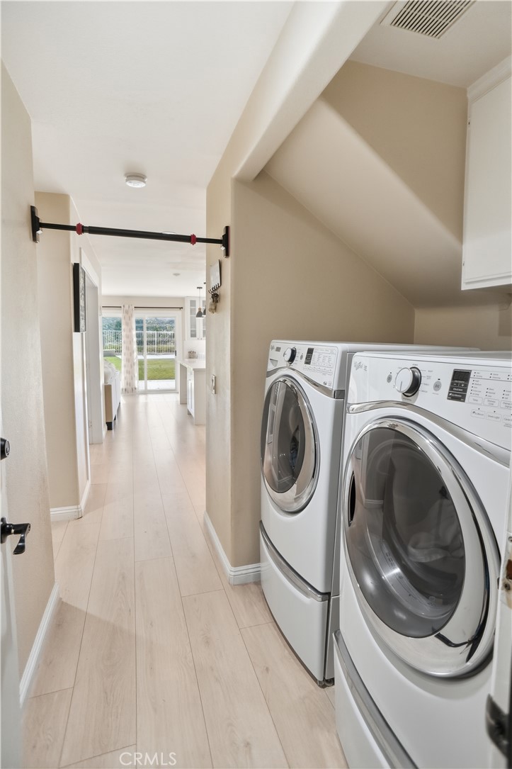 25550 Longfellow Place Stevenson Ranch, CA 91381 - Photo 14 of 30 a utility room with dryer and washer