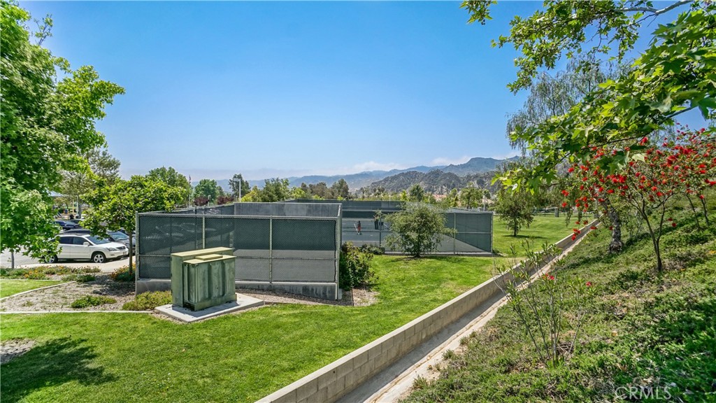 25550 Longfellow Place Stevenson Ranch, CA 91381 - Photo 29 of 30 a view of a garden with a sitting area