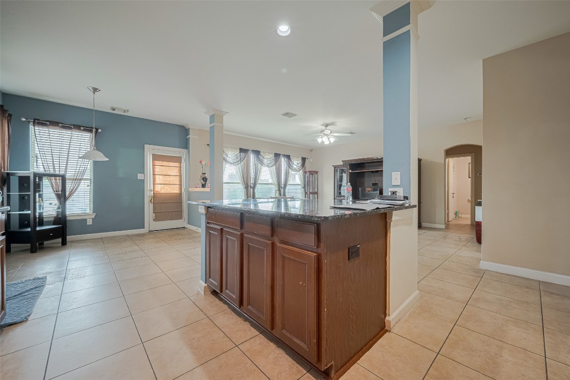 1703 Macclesby Lane Houston, TX 77049 - Photo 14 of 41 a kitchen with stainless steel appliances granite countertop a refrigerator and a stove top oven