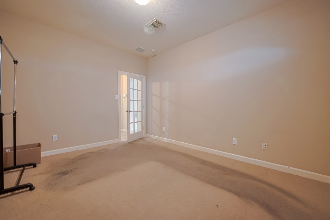 1703 Macclesby Lane Houston, TX 77049 - Photo 19 of 41 a view of an empty room with a window