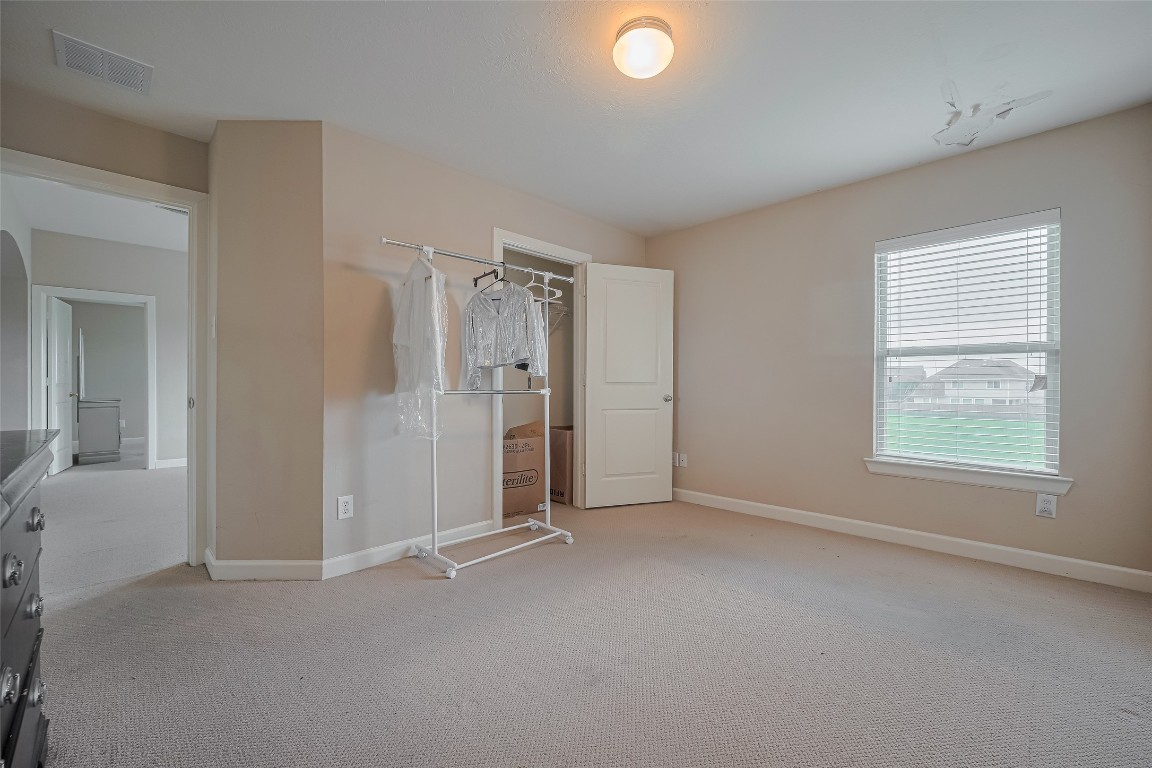 1703 Macclesby Lane Houston, TX 77049 - Photo 23 of 41 an empty room with windows