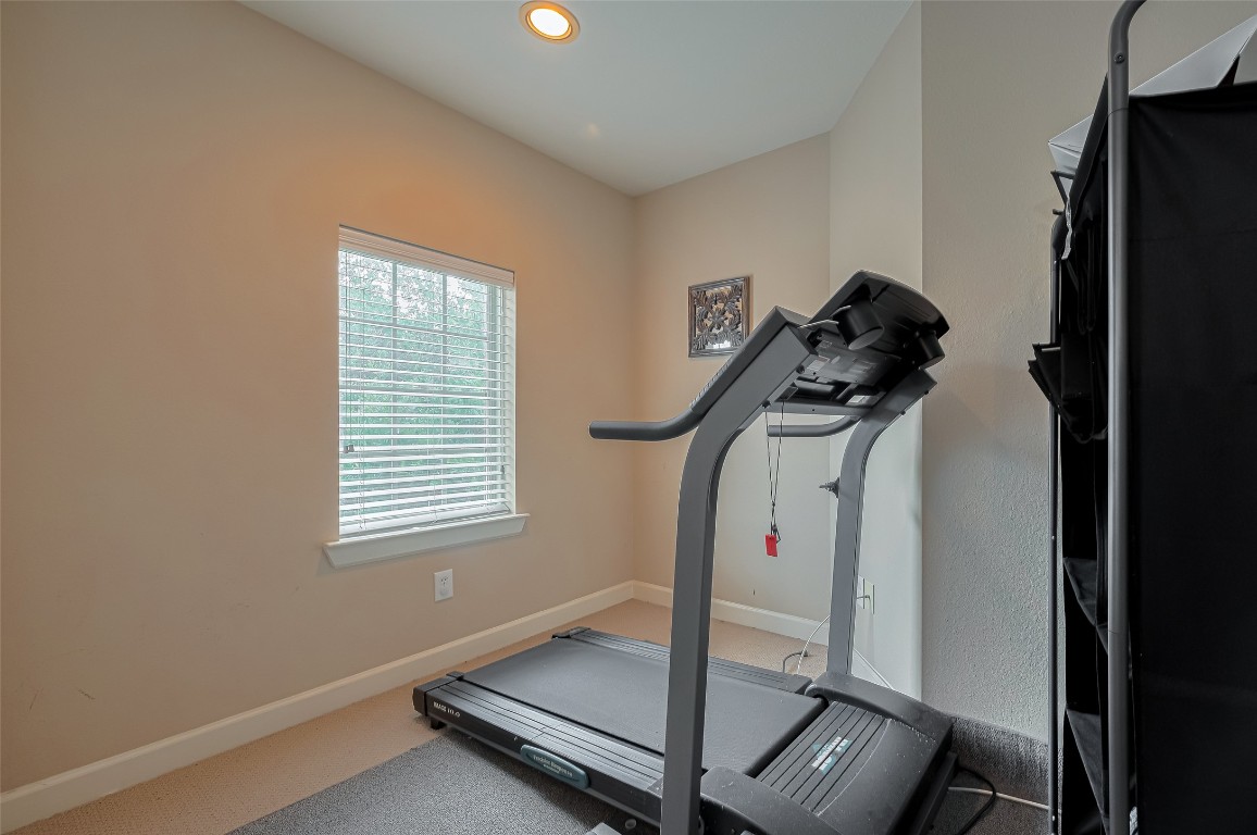1703 Macclesby Lane Houston, TX 77049 - Photo 32 of 41 a view of a room with gym equipment