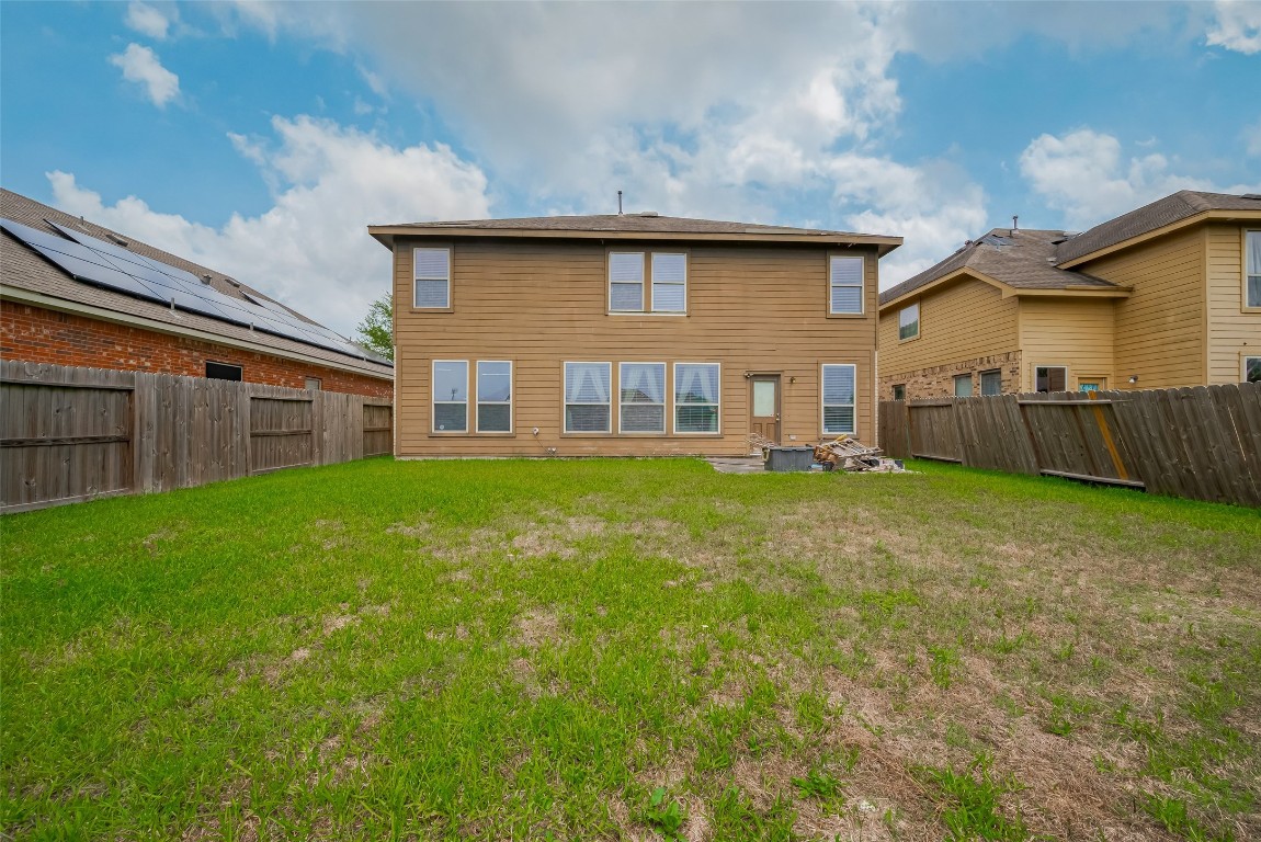 1703 Macclesby Lane Houston, TX 77049 - Photo 38 of 41 a house view with swimming pool and garden