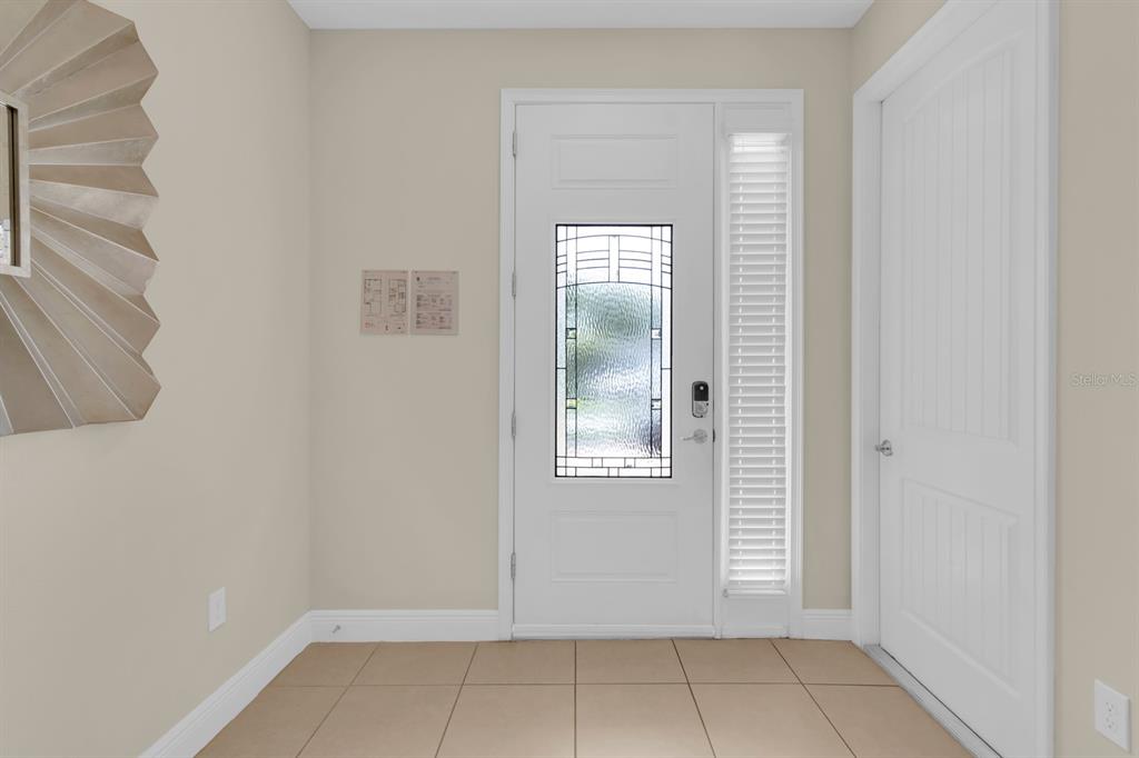 7403 Marker Avenue Kissimmee, FL 34747 - Photo 3 of 49 an empty room with windows