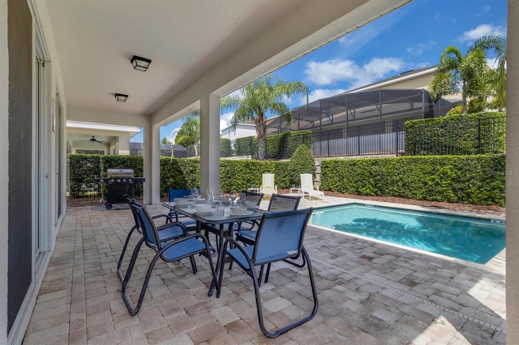 7403 Marker Avenue Kissimmee, FL 34747 - Photo 37 of 49 a view of a patio with a backyard