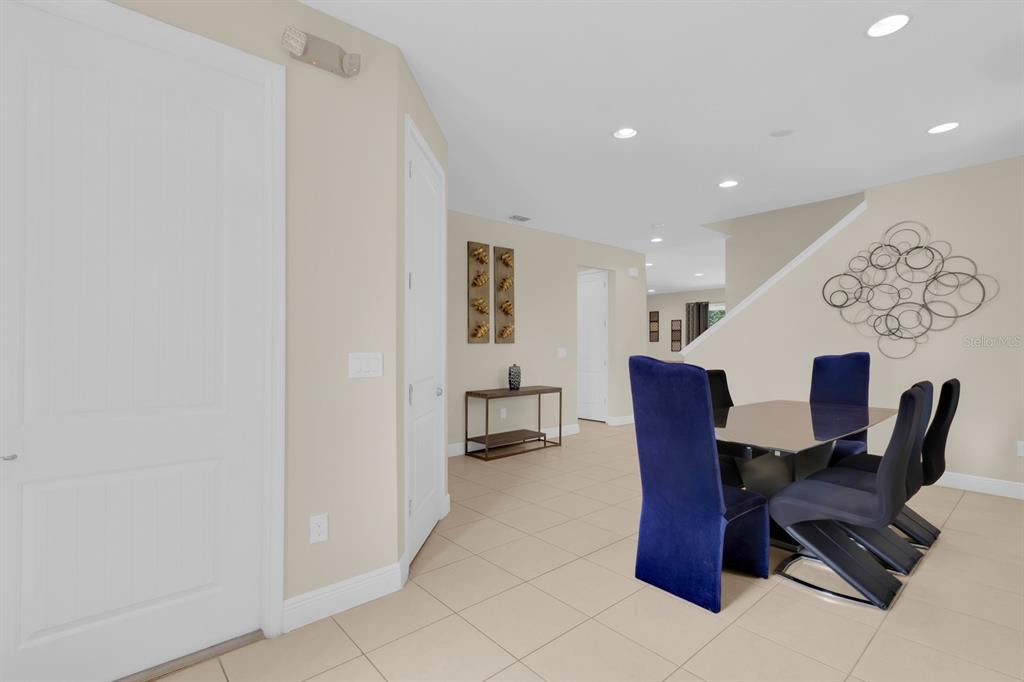 7403 Marker Avenue Kissimmee, FL 34747 - Photo 4 of 49 a view of a dining room with furniture