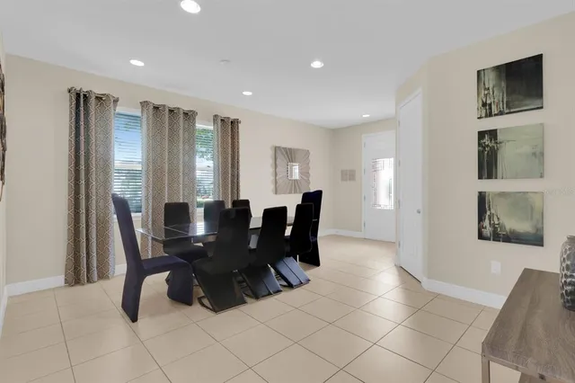 a view of a dining room with furniture