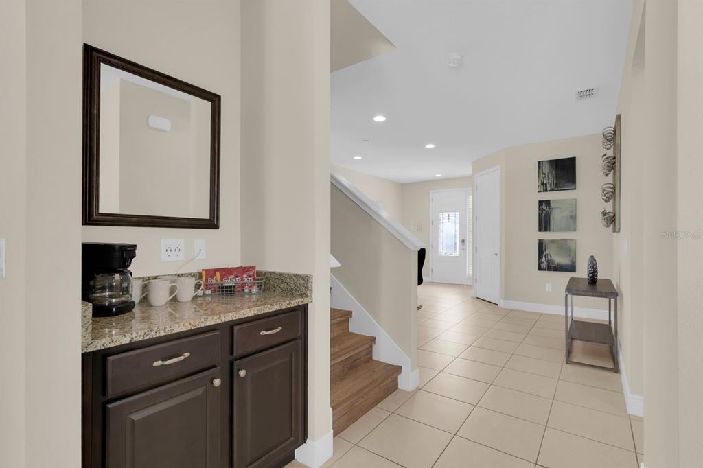 7403 Marker Avenue Kissimmee, FL 34747 - Photo 6 of 49 a kitchen with a sink and cabinets