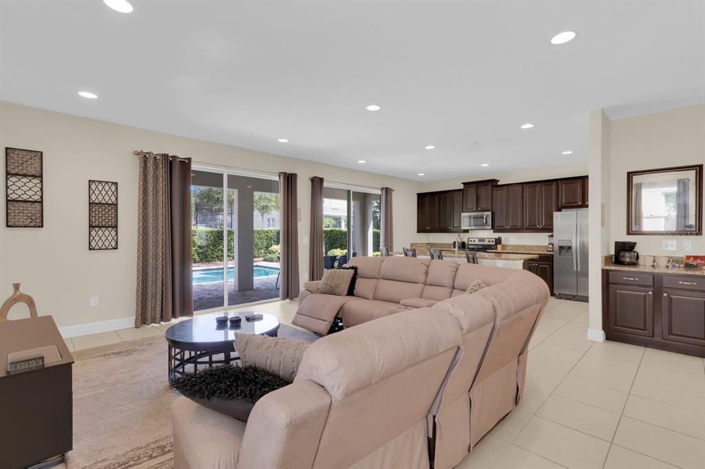 7403 Marker Avenue Kissimmee, FL 34747 - Photo 7 of 49 a living room with furniture and a large window
