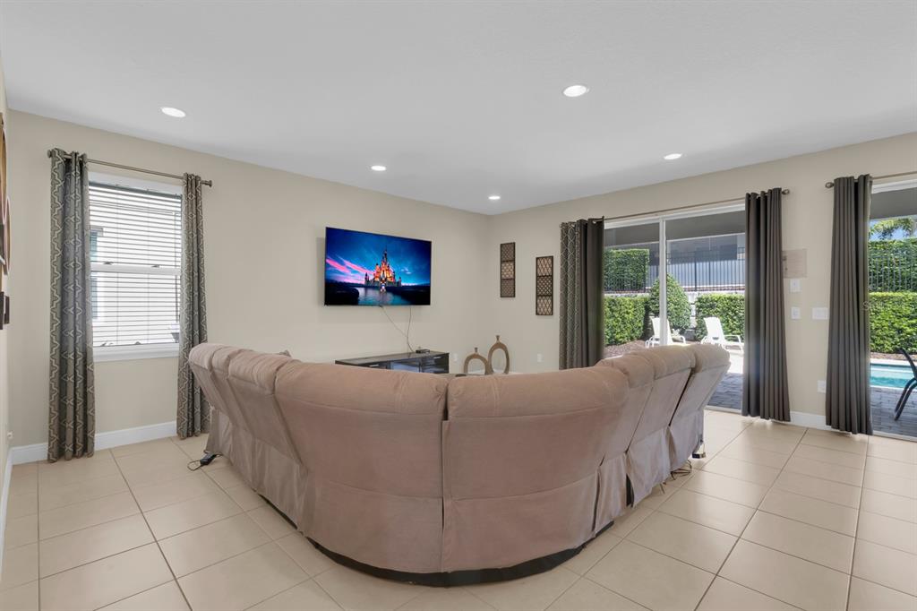 7403 Marker Avenue Kissimmee, FL 34747 - Photo 8 of 49 a living room with furniture and large window