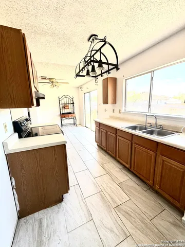 a kitchen with a stove and a microwave