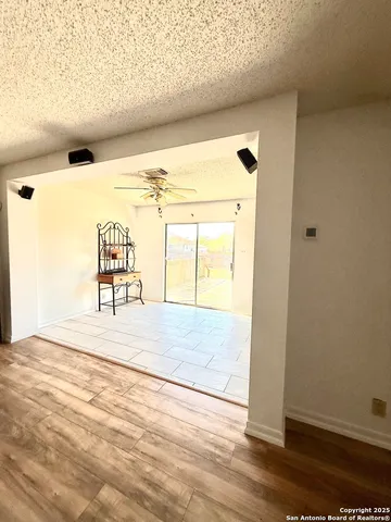 a view of a big room with wooden floor
