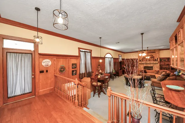 a view of a chairs and tables in a room