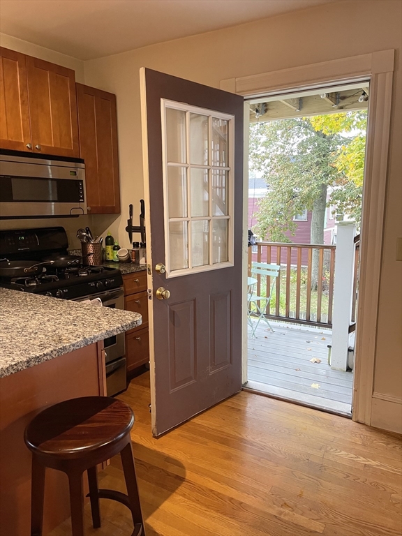 2 Hagar Street, Unit 2 Boston, MA 02130 - Photo 12 of 19 a view of kitchen with furniture and staircase
