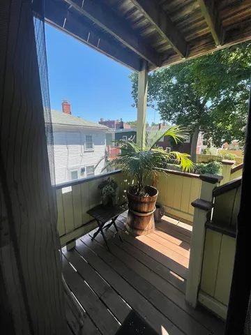 a outdoor dining space with furniture