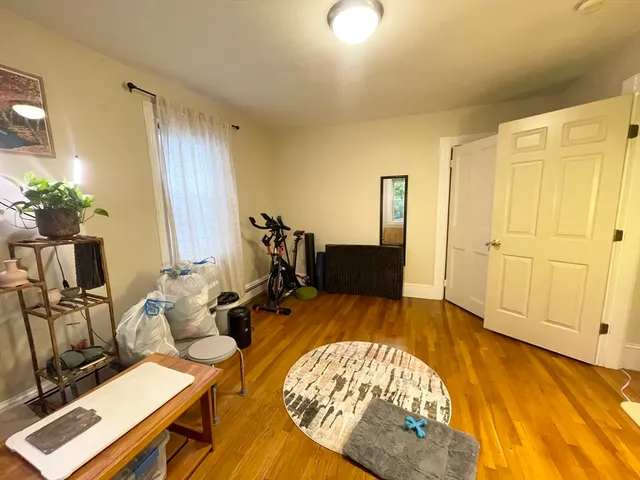 a bed room with a bed and a table