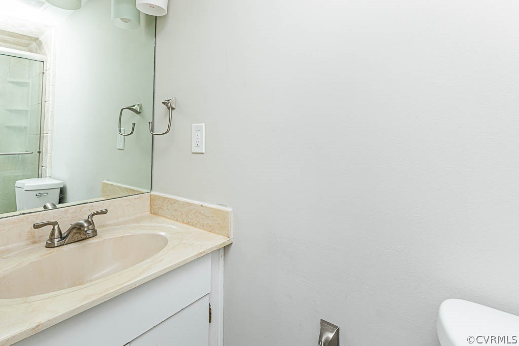 1511 Regency Woods Road, Unit 302 Henrico, VA 23238 - Photo 14 of 23 a bathroom with a sink and a toilet