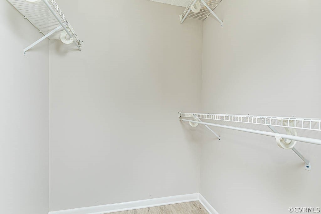 1511 Regency Woods Road, Unit 302 Henrico, VA 23238 - Photo 18 of 23 a view of a room with racks on the wall