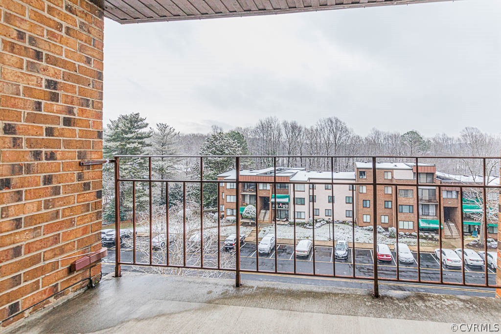 1511 Regency Woods Road, Unit 302 Henrico, VA 23238 - Photo 20 of 23 a view of a balcony with a floor to ceiling window