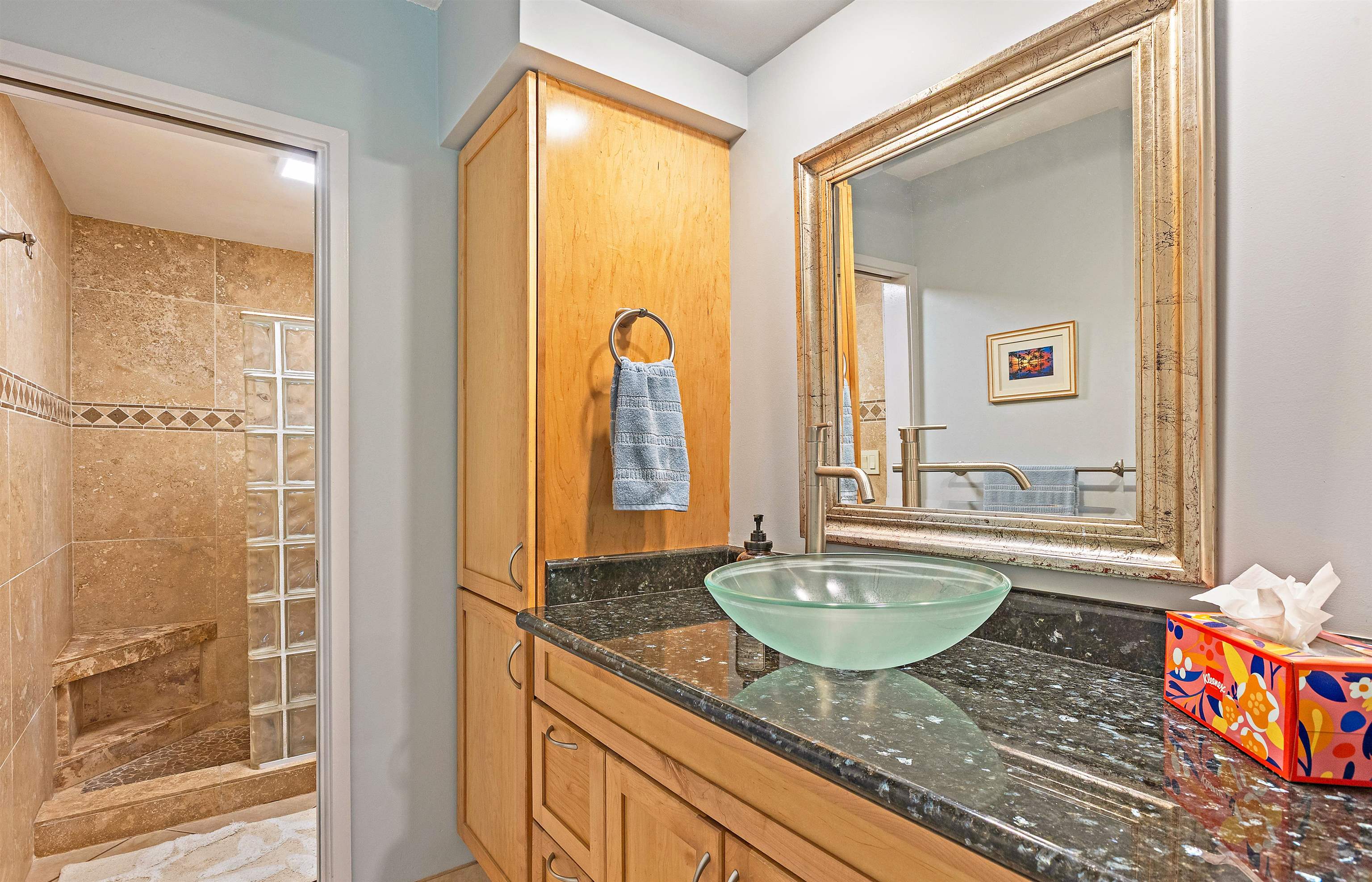 3788 Lower Honoapiilani Road, Unit A110 Lahaina, HI 96761 - Photo 18 of 35 a bathroom with a granite countertop sink and a mirror