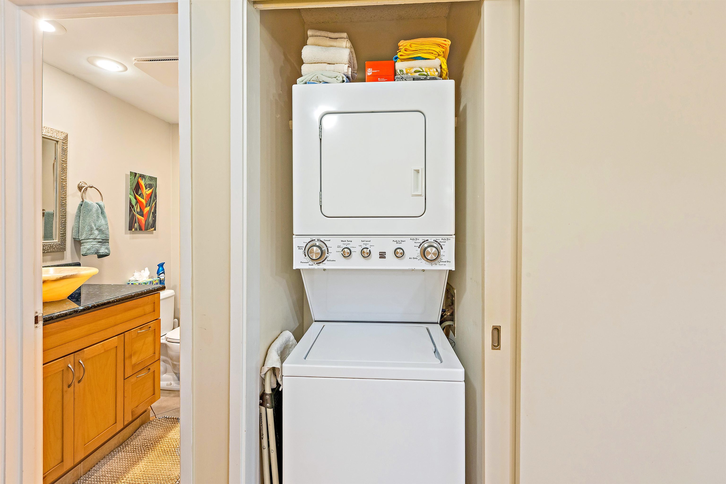 3788 Lower Honoapiilani Road, Unit A110 Lahaina, HI 96761 - Photo 19 of 35 a utility room with dryer and washer