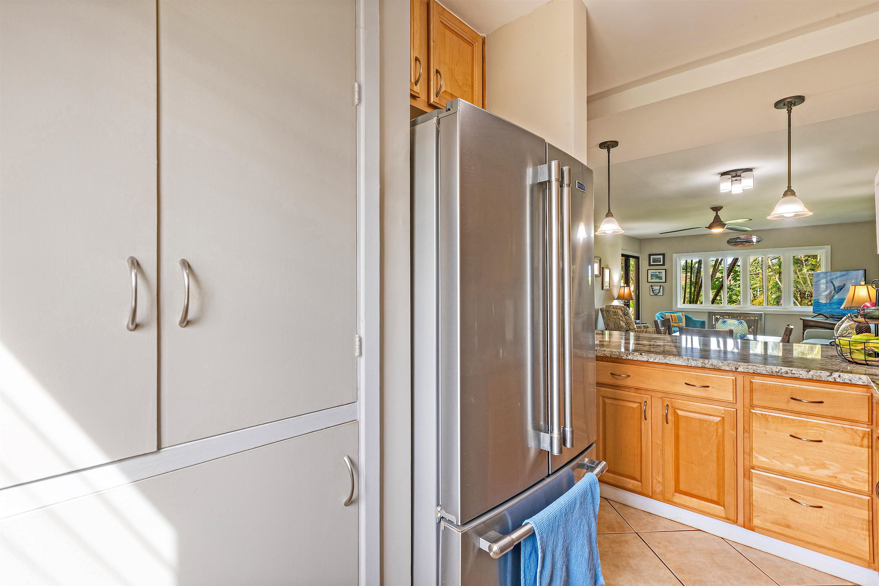 3788 Lower Honoapiilani Road, Unit A110 Lahaina, HI 96761 - Photo 20 of 35 a view of a kitchen from the hallway