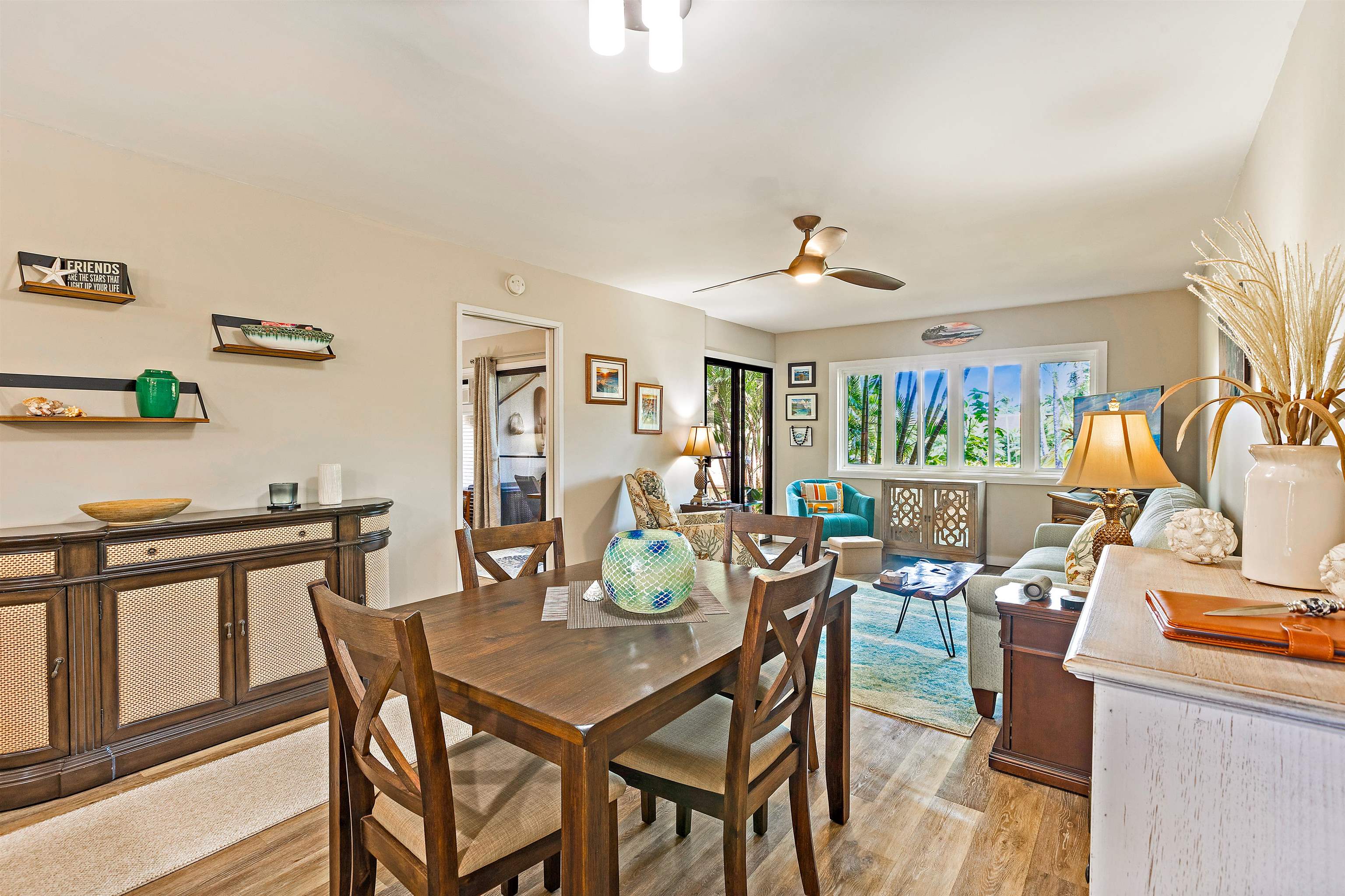 3788 Lower Honoapiilani Road, Unit A110 Lahaina, HI 96761 - Photo 2 of 35 a view of a dining room with furniture and a window